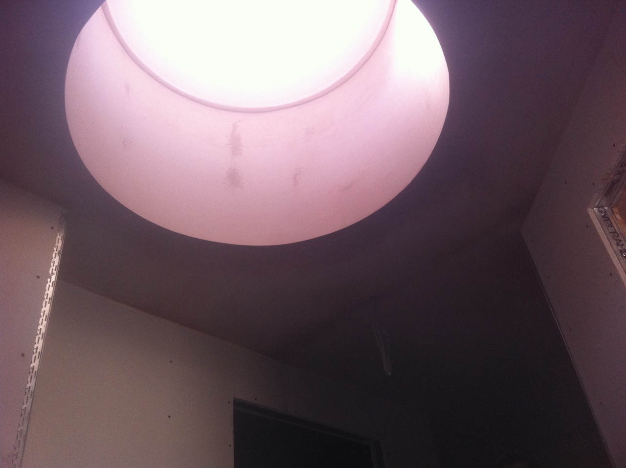 A round roof-lantern shaft plastered smooth