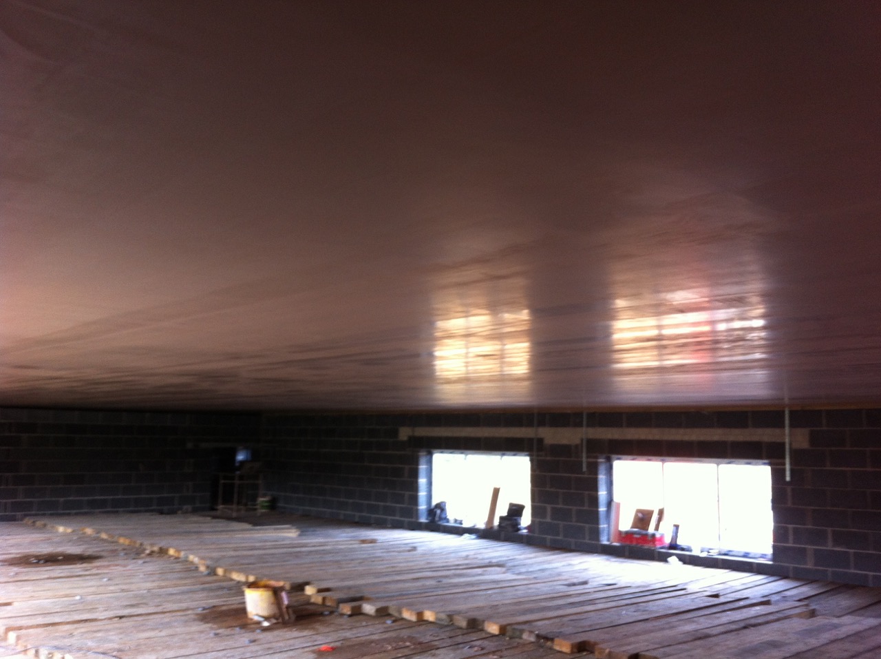 The same large room with the ceiling skimmed