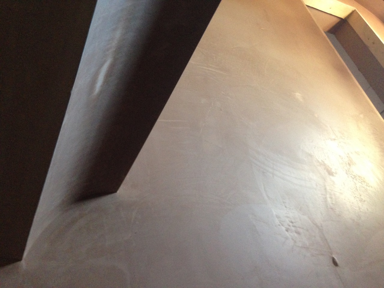 An angled eaves ceiling skimmed